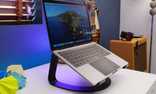 A MacBook Pro on a laptop stand. 