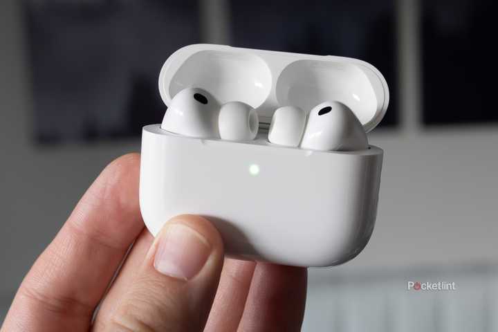 AirPods Pro 3 in their case being held