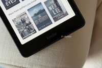 Kindle e-reader on a couch.