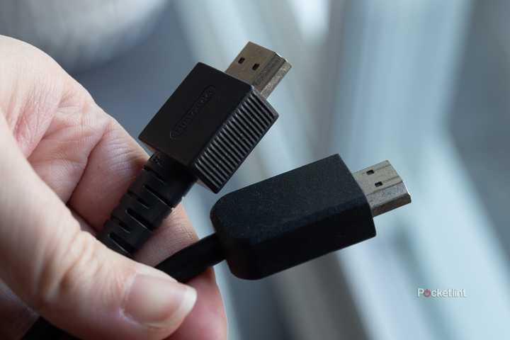 HDMI cords in hand