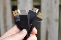 HDMI cables held in bundle.