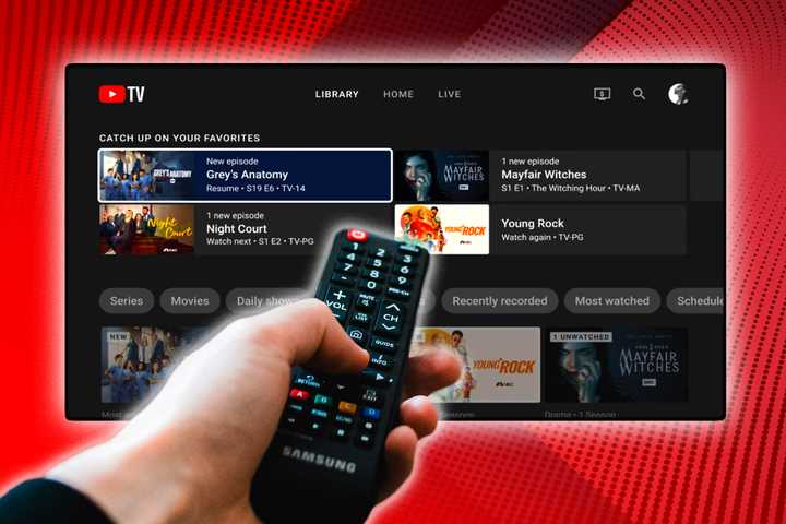 A person with a remote pointing it at YouTube TV. 