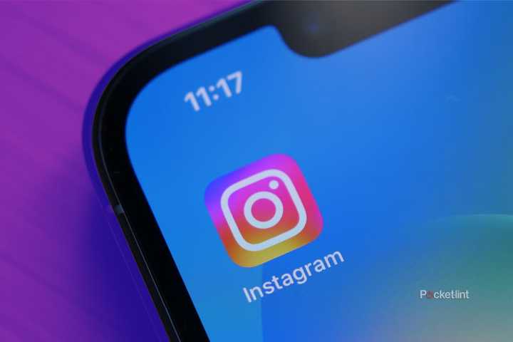 Instagram app on phone on colored background