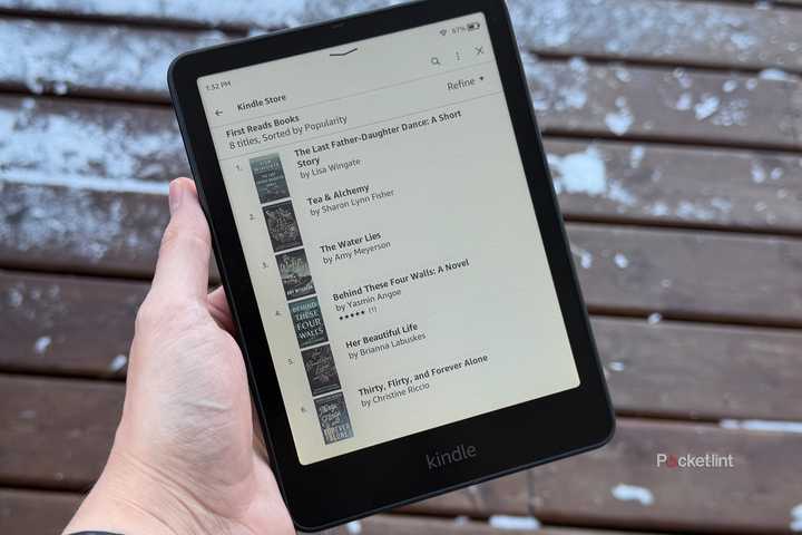 Kindle in front of snow covered deck.