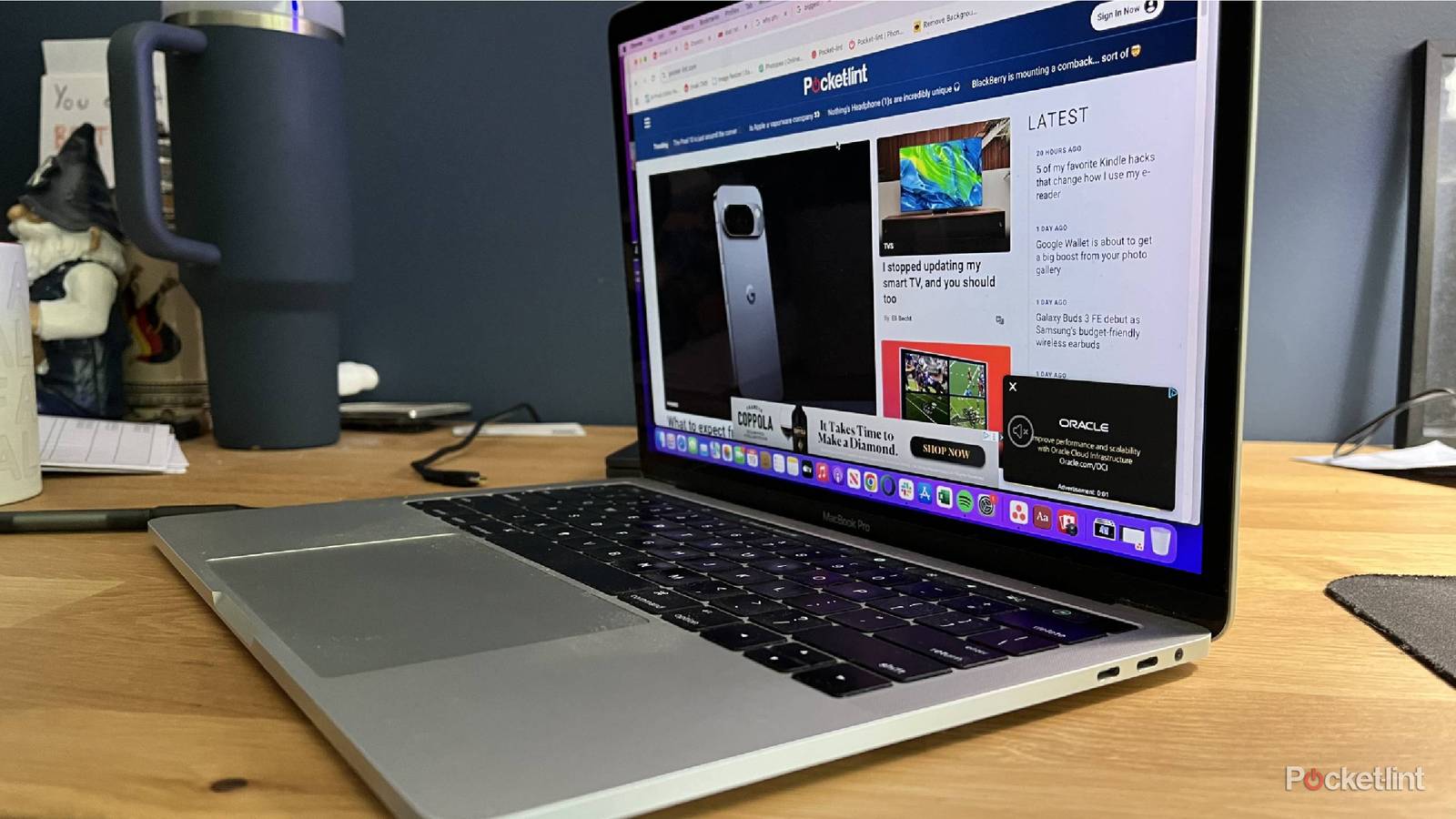 An open MacBook Pro with its side ports showing.